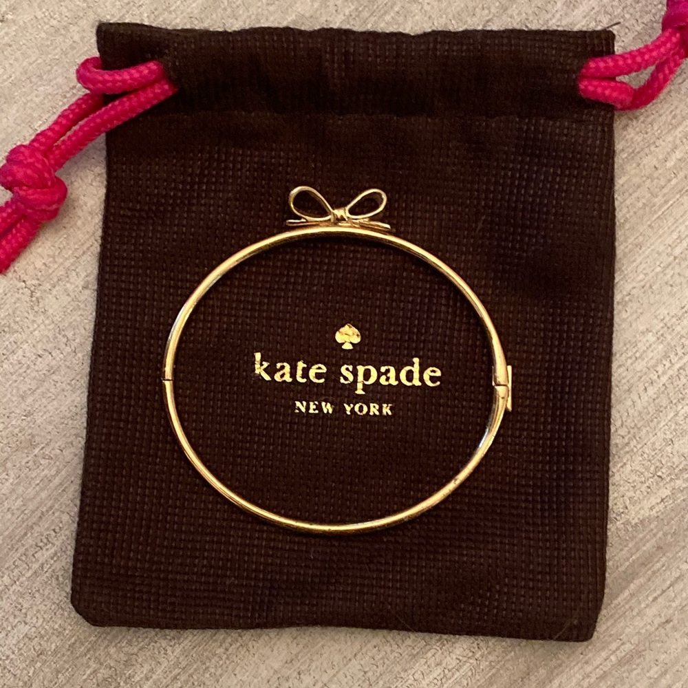 Kate Spade, bow bracelet. Like new. Bag included